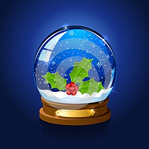 Christmas snow globe with holly berry