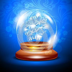 Christmas snow globe with a snowflake