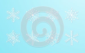 Christmas snowflakes collection white isolated on blue gradient background. Cute snow icons with intricate silhouette