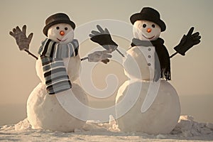 Christmas snowman couple of spy agent or gentleman