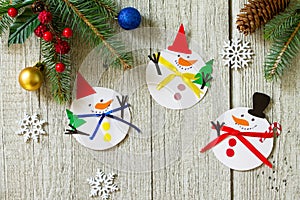 Christmas snowman merry gift. Handmade. Project of children`s creativity, handicrafts, crafts for kids