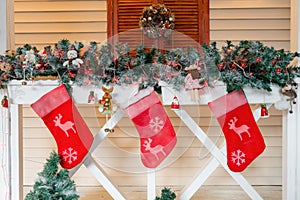 Christmas sock and decoration on wood.