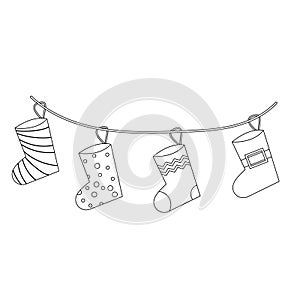 Christmas sock set for gifts on a string in line style. Vector illustration