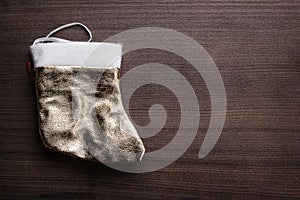 Christmas sock on the wooden background