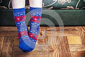 Christmas socks in blue on feet