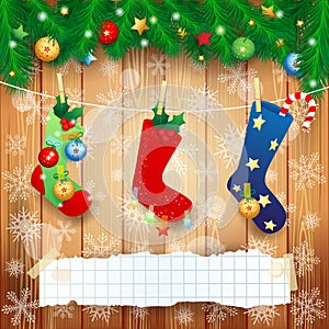 Christmas socks and copy space on wooden background
