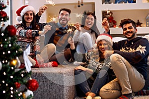 Christmas sparklers- people enjoying party on Christmas