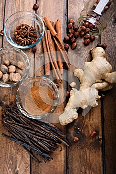 Christmas spices on a wood background