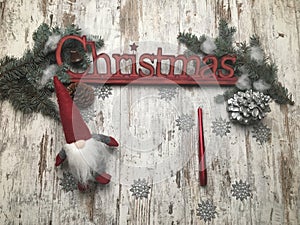 Christmas staff: symbol, pine tree, newyear tree, santa, cone, candle, silver snowflakes on wood background