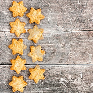 Christmas Star Biscuits on Rustic Brown Wood