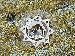 Christmas star with a Christmas nativity scene. New year concept. Christmas toy made of wood.  New year concept.