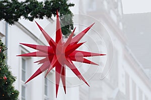 Christmas star with raindrops, street decoration, copy space