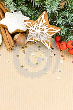 Christmas star shaped cookies with white icing, red berries, nut
