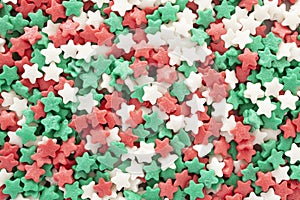 Christmas star shaped sprinkles background.