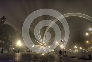 Christmas star in Verona, Italy, and fog at night