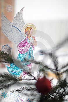 Christmas sticker on the window angel