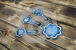 Christmas stickers blue on wooden
