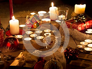 Christmas still life with candles of different size and shape, d