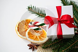 Christmas Still Life with a Gift on the White Background. Copy Space. Background
