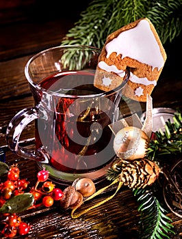 Christmas still life with hot drink and spruce branch.