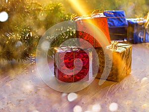 Christmas still life of a toy sled, Vintage photo, Gifts for Christmas on wooden sled, Merry Christmas tree transporter