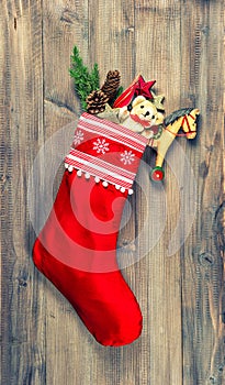 Christmas stocking with nostalgic vintage toys decoration photo