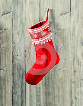 Christmas stocking. red sock with snowflakes for gifts