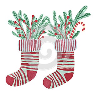 Christmas stocking with sweets, pine branches and berries, isolated on white background. Hand drawn illustration