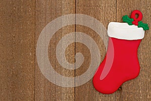 Christmas stocking on weathered wood holiday background