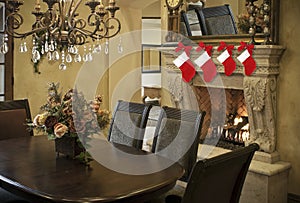 Christmas stockings on fireplace mantel photo