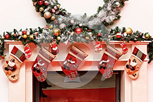 Christmas stockings on a fireplace mantel