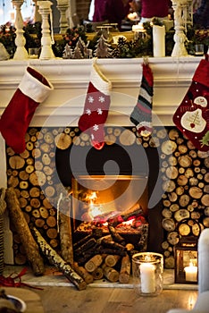 Christmas stockings hanging by the chimney