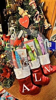 Christmas stockings with initial, Tree with decorations, candycanes