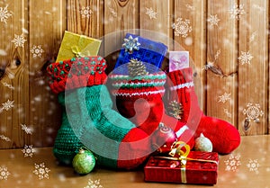 Christmas stockings on wooden background