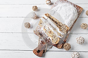 Christmas stollen or Christstollen on white background with space for text. Flat lay