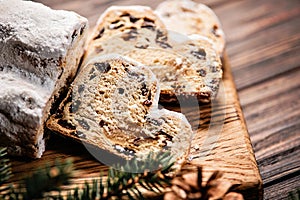 Christmas stollen on wooden background. baking for xmas