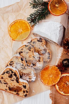 Christmas stollen on wooden background. baking for xmas