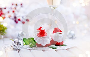 Christmas strawberry Santa. Funny dessert stuffed with whipped cream