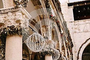 Christmas street decorations, walls of houses in the old town of Dubrovnik, Croatia.