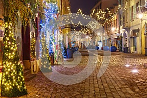 Christmas street at night in Colmar, Alsace, France