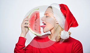 Christmas summer destinations. Christmas girl eat watermelon. Prolong summer. Travel christmas vacation and holidays photo