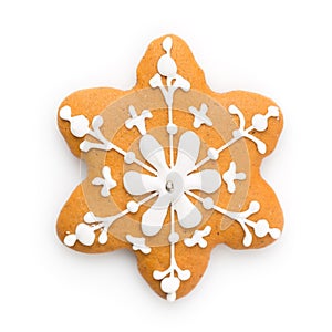 Christmas symbol. Gingerbread snowflake cookie isolated on white background
