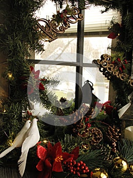 Christmas window decorations, believe, peace,  two doves, red poinsettia flower, pine cones