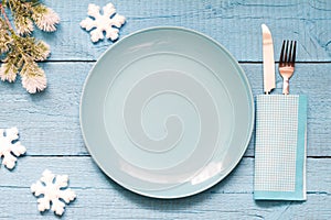 Christmas table and empty plate background concept