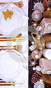 Christmas table with gold centerpiece and elegant fine china tableware.