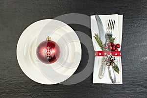 Christmas table place setting. Holidays background. Top view with copy space.