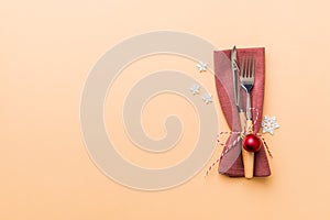 Christmas table place setting with knife, napkin and fork. Holidays new year background with copy space