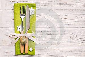 Christmas table place setting with knife, napkin and fork. Holidays new year background with copy space