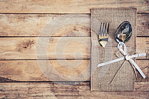 Christmas table place setting and silverware with space.