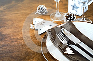 Christmas table place setting in vintage or rustic style.